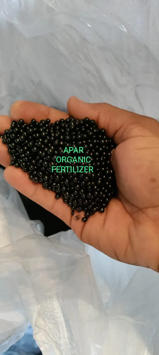 Black granules in hand