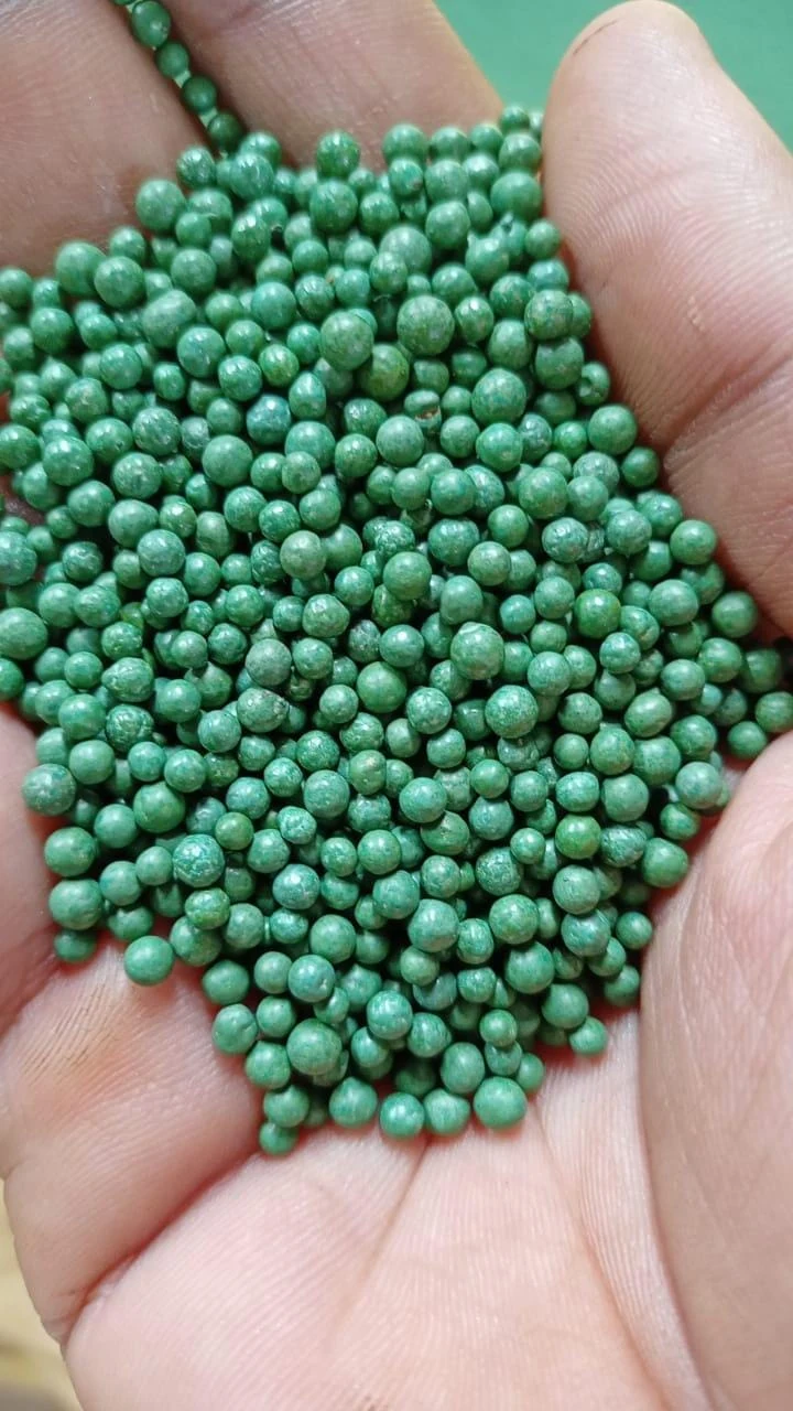 Green fertilizer granules supplied by Apar